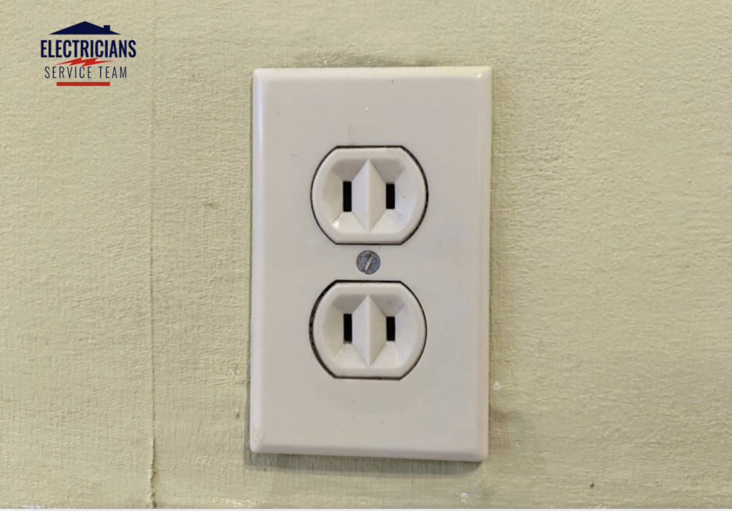 Old two-prong ungrounded electrical outlet in a home that needs to be upgraded for safety