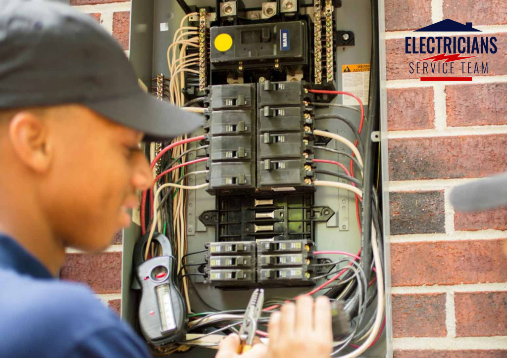 Licensed electrician safely installing GFCI breaker inside residential electrical panel to fix open ground outlets