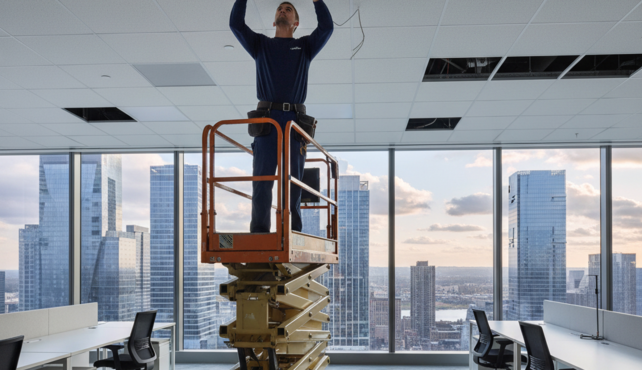 Licensed electrician performing commercial electrician work for Electricians Service Team