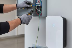 Electricians Service Team crew member working on ev charger installation