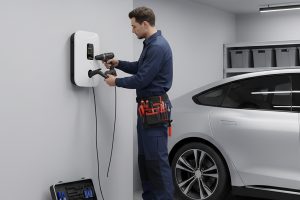 Electricians Service Team crew member working on ev charger installation